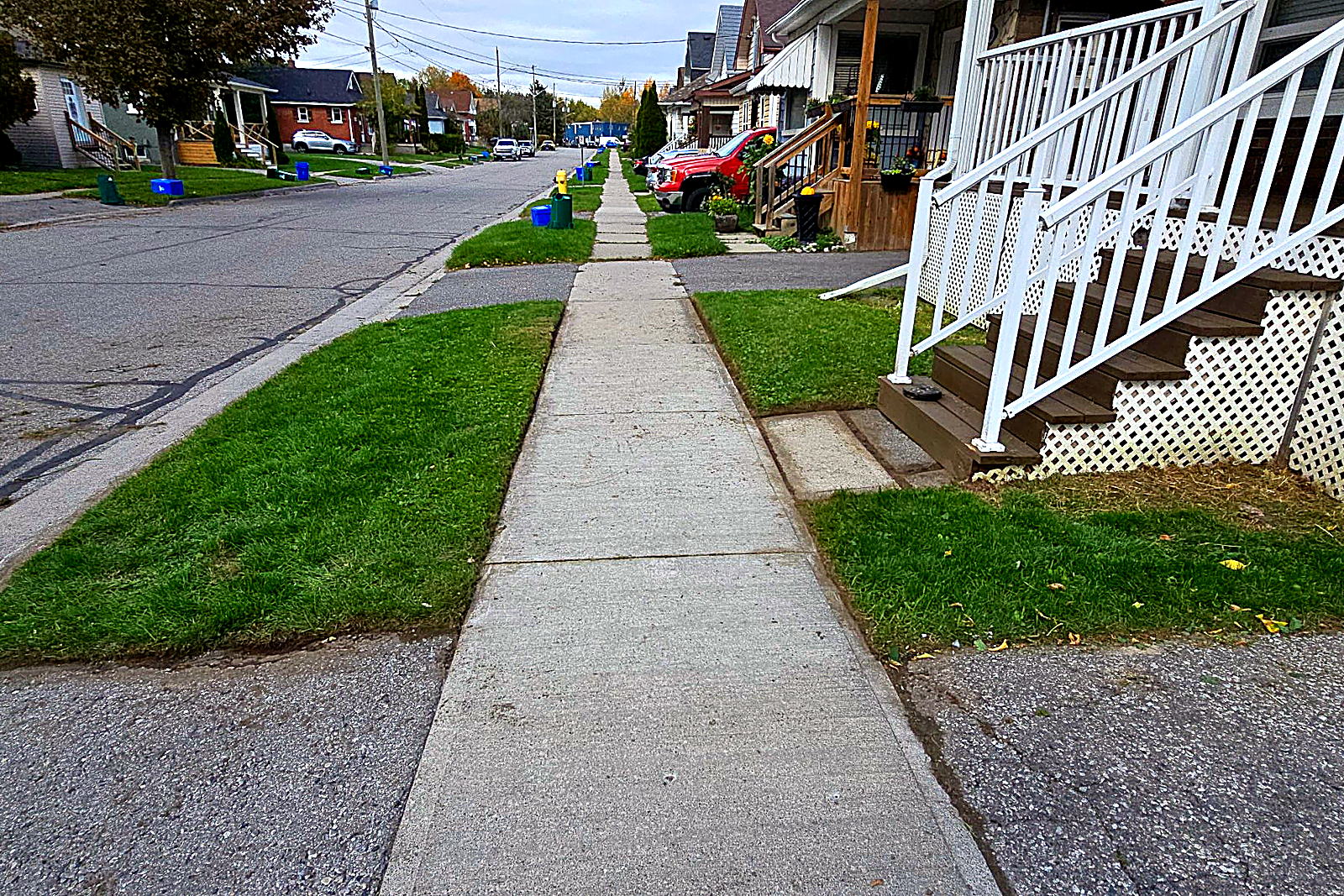 The same frontage cut, with the sidewalk edged on both sides